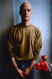 Tommy in the window by Nan Goldin, 1989, On the back: signature, offered Apr 2025