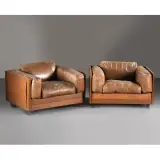 A Couple Of 920 Armchairs by Tobia Scarpa, WOOD STRUCTURE, offered Jul 2026