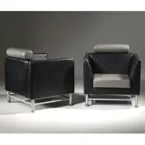 Untitled by Ettore Sottsass, A COUPLE OF «EAST SIDE» ARMCHAIRS, offered Jul 2025