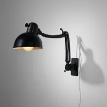 Wall lamp by Christian Dell, c. 1932, enameled steel, aluminum, sold Mar 2023
