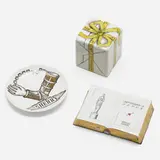 Souvenir d'Amitié paperweight and Vini e Liquori coaster by Piero Fornasetti, c. 1965, transfer-printed, glazed, and gilt porcelain, sold Mar 2023