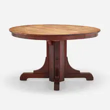 Dining table by Gustav Stickley, c. 1914, oak, sold Mar 2024