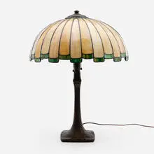 Table lamp by Handel, c. 1915, patinated metal, leaded slag glass, sold Mar 2024