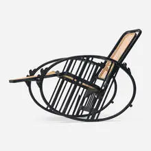 Max Fabiani, Egg rocking chair, model 267, lacquered beech, cane