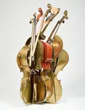 Arman, Squeezed, 1987, violoncello in bronze and legno sezionato