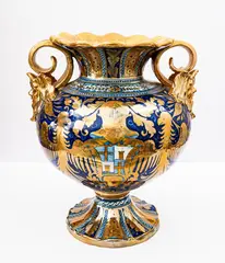 Alfredo Santarelli, Grande vaso biansato a lustro metallico di forma globulare decorato con mascheroni a rilievo e anse [..]