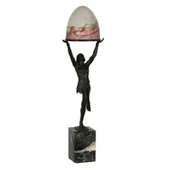 Max Le Verrier, patinated, bronze, mounted to marble plinth, the figure supporting a domed mottled glass shade;