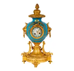 A French Porcelain and Gilt, Untitled, bronze mantel clock