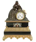 A French Patinated, Untitled, bronze and slate figural mantel clock