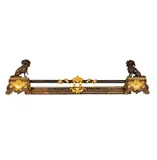 A Patinated and Gilt, Untitled, bronze fireplace fender