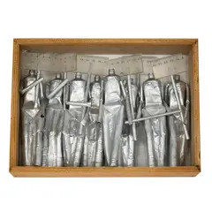 Rodriguez, Rene Francisco Rodriguez B. 1960 Para Tomar Medidas, mixed media (paint tubes, ruler) in wooden box 2003;
