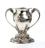 P.W. Ellis & Co., A Canadian sterling silver large two-handled Presentation Cup, 1905, On a stepped domed base with wavy rim applied with climbing flowers and foliage