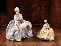 Two porcelain groups by Luigi Fabris, depicting two ladies in eighteenth-century dresses, offered Jul 2024