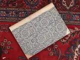 Large folio album for memories, drawings, photographs by Mariano Fortuny y Madrazo, rigid binding in half parchment with plates covered in "Maori" damask fabric in shades of blue and silver, offered Jun 2024