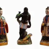 Jacob Petit, Three exotic figures in polychrome porcelain, Paris 19th century, including a pair dressed in oriental style