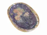 Pippo Pozzi, Oval porcelain tray, painted and graphite with a motif of stylized flowers on a purplish background