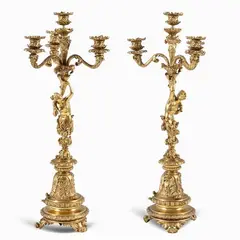 Giuseppe Succi, Pair of four lights gilt bronze candelabra, chiselled and decorated with floral patterns and female figures