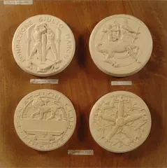 Four medallions by Mario Moschi, offered Jul 2023