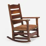 Early arm rocker, model 2631 by Gustav Stickley, c. 1902, oak, leather, copper, sold Dec 2023