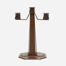 Strap-form candelabrum by Dirk Van Erp, c. 1913, handwrought copper, sold Dec 2023