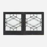 Frank Lloyd Wright, Windows from the Warren Hickox House, Kankakee, Illinois, pair, c. 1900, opaque and clear glass, zinc, painted wood
