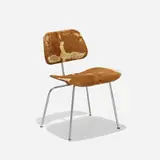 DCM by Charles and Ray Eames, chrome-plated steel, slunk skin, walnut, rubber, sold Feb 2017