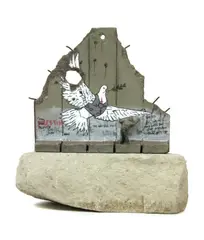 Untitled by Banksy, hand-painted resin sculpture with West Bank Separation Wall base, sold Oct 2020