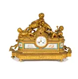 Untitled by A French Gilt, bronze and porcelain figural mantel clock, offered Dec 2024