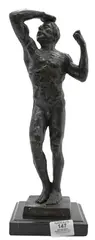 Auguste Rodin, The Age of Bronze, bronze on black marble base of a male nude Marked on base A.Rodin Height 16 1/2