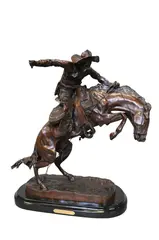 Frederic Remington, Bronco Buster, bronze on black base