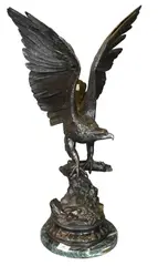 Eagle by Jules Moigniez, bronze on green marble base, offered Jun 2025