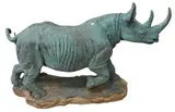 Cast, Untitled, bronze sculpture of rhinoceros on realistic ground base
