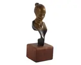 Untitled by Andrew DeVries, bronze bust of a woman, offered Jan 2026