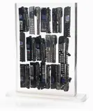 Arman, Untitled, 2005, Inclusione di sezioni di telefoni cellulari in resina e plexiglass