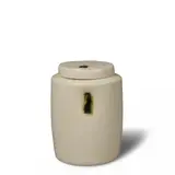 Lidded Jar by Edmund de Waal, creamy white celadon glazed porcelain with vivid green highlights, impressed with maker's mark, sold Jul 2025