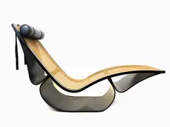 A Rio Painted Bentwood, Caning and Leather Rocking Lounge Chair, 1978 ca. by Oscar Niemeyer, 1907, in legno curvato laccato nero e paglia di Vienna, offered Nov 2018