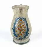 Galileo Chini, Single-handled jug, In salty stoneware decorated in blue and orange with a vegetable motif. Marked with the San Lorenzo furnace grille