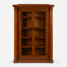 Cabinet from the Conroy Building, Milwaukee by George Mann Niedecken, c. 1904, walnut, glass, sold Dec 2023