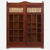 Stickley Brothers, Bookcase, c. 1915, oak, clear and slag glass, zinc, copper