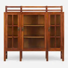 Charles Stickley, Three-door china cabinet, model 1915, c. 1911, oak, glass, hammered brass