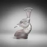 Tête de paon car mascot, model 1140 by René Lalique, sold Jun 2023
