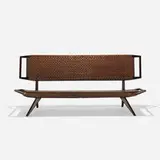 Paul Laszlo, settee, 1950, stained mahogany, cane