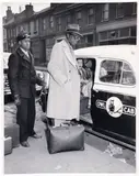 Charles Harris, (American/Pittsburgh, 1908-1998), Nat King Cole and Maria Cole with Owl Cab driver Leo Dodson, Hill District, taken