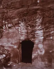Linda Connor, Tomb Doorway, Petra, Jordan, 1995, sienna toned black and white, photograph