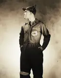George Platt Lynes, J. C. Stewart posing in his work coveralls, circa 1940s
