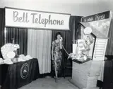 Charles Harris, (American/Pittsburgh, 1908-1998), Doris Mixon demonstrating Princess phone in Bell Telephone booth in Syria Mosque for the 1960 Courier-WAMO Home-A-Rama
