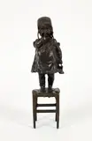 Standing Girl on Stool by after Juan Clara, bronze sculpture, artist's name on the left edge of the stool, 11.5 inches tall, offered Nov 2025