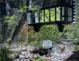 Exterior of Martin Prekop's Mirrored House, color by Fred Scruton, photograph, offered Nov 2025