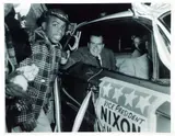 Charles Harris, (American/Pittsburgh, 1908-1998), Vice President Richard Nixon and Pat Nixon greeting crowd from car, including Harold Irwin, Centre Avenue, Hill District