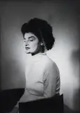 Man Ray, (American/French, 1890-1976), Portrait of Juliet in Make Up, undated, glossy silver gelatin, photograph, Man Ray and Juliet written in black ink on the verso, full